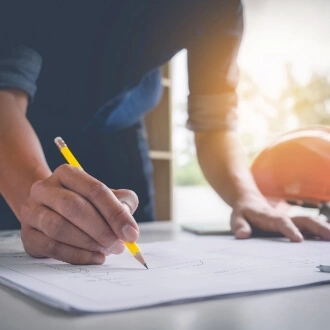 contractor writing out plans